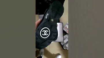 Black female Chanel sneakers