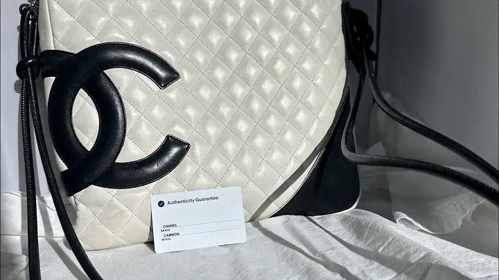Showcasing a RARE AUTHENTIC PREOWNED Chanel Cambon White Crossbody Bag