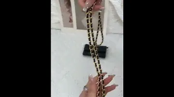 CHANEL Mini Bag with Lychee leather and light gold buckles (black)
